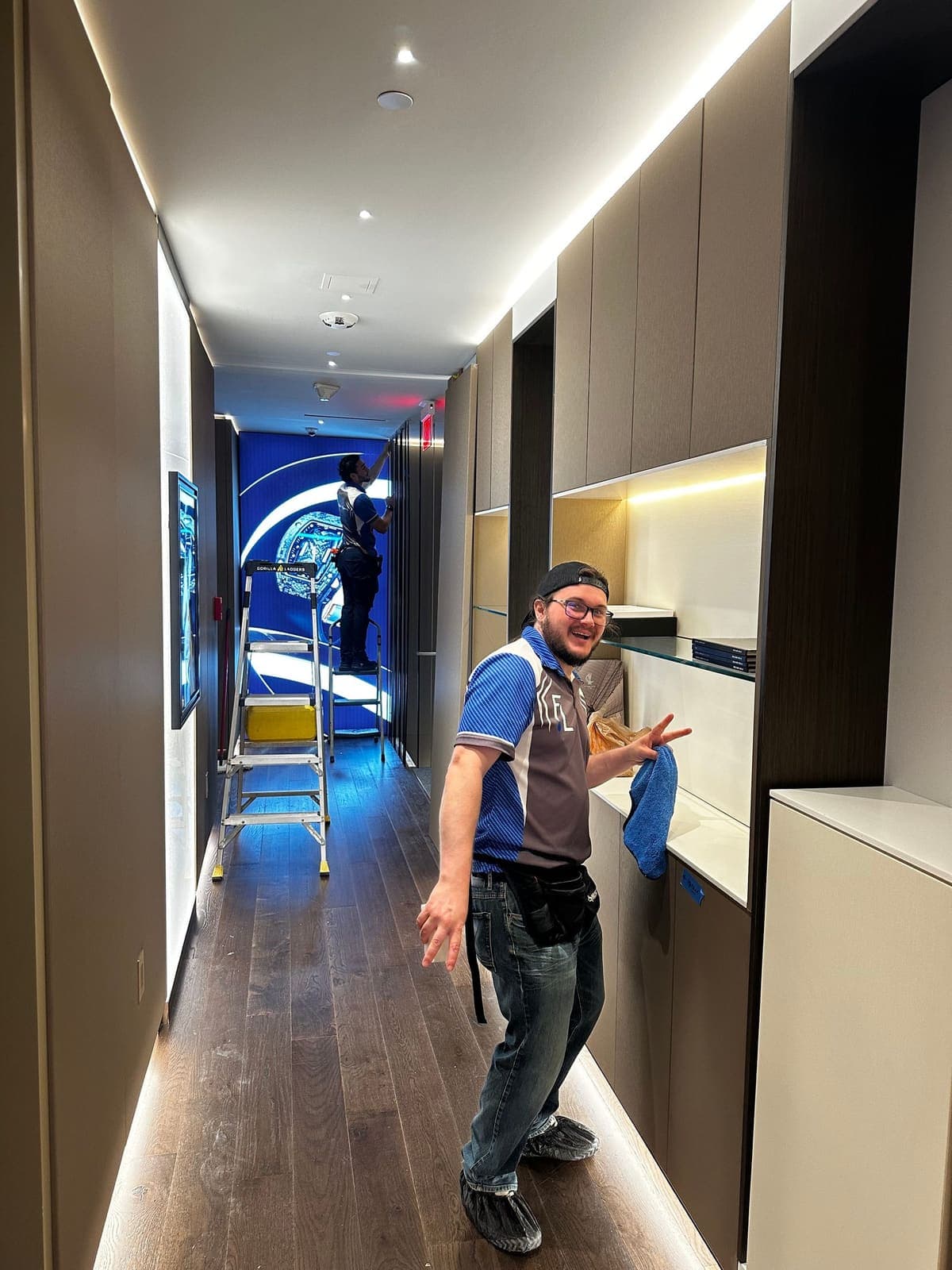 Crew member on site in a commercial corridor