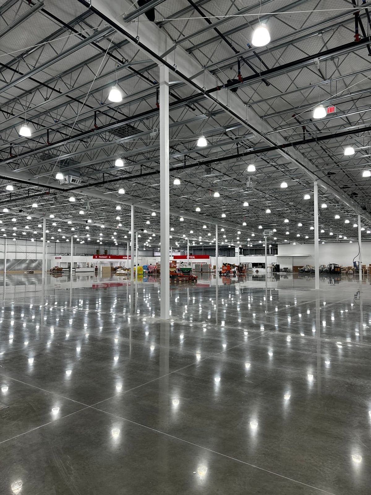 Large-format retail concrete floor polished to a mirror finish