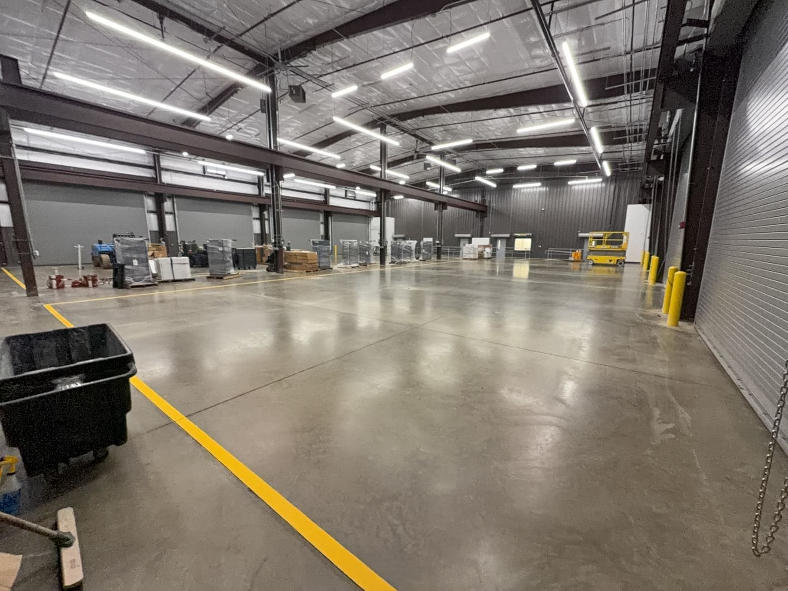 Industrial service shop with polished concrete and fresh safety striping