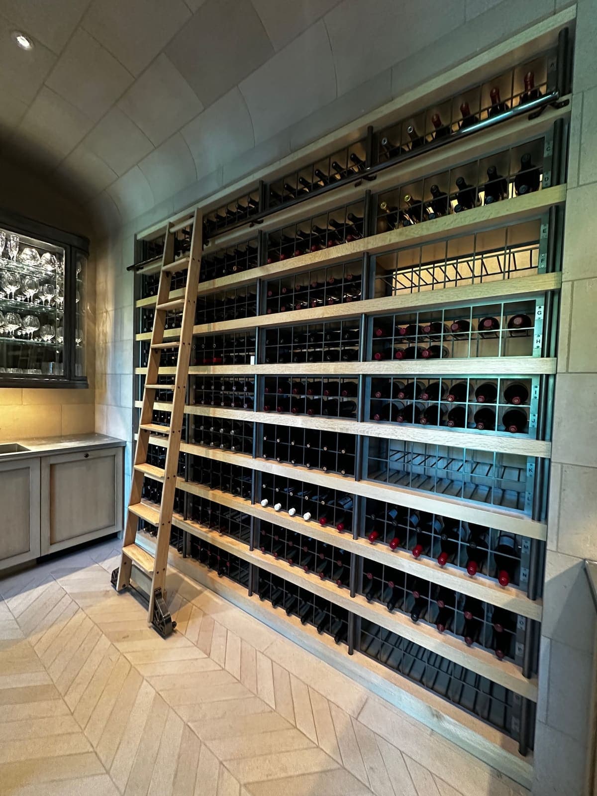 Custom wine cellar in a private estate, detailed and maintained by BLU